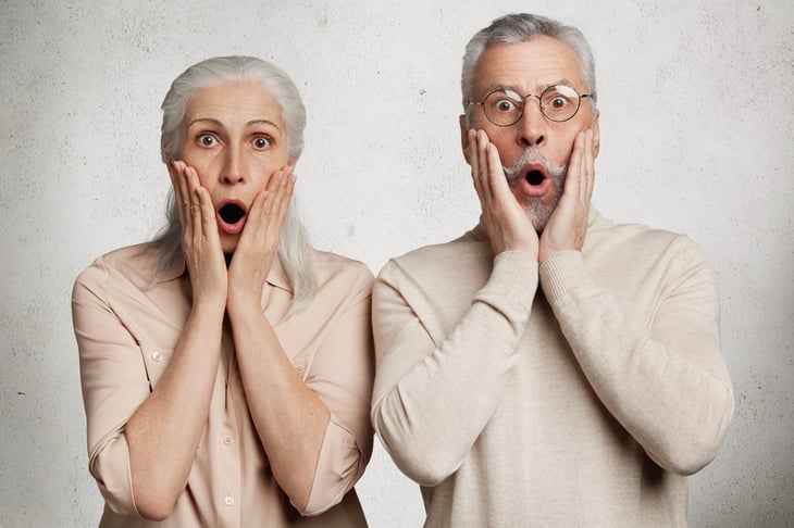 A senior couple is surprised