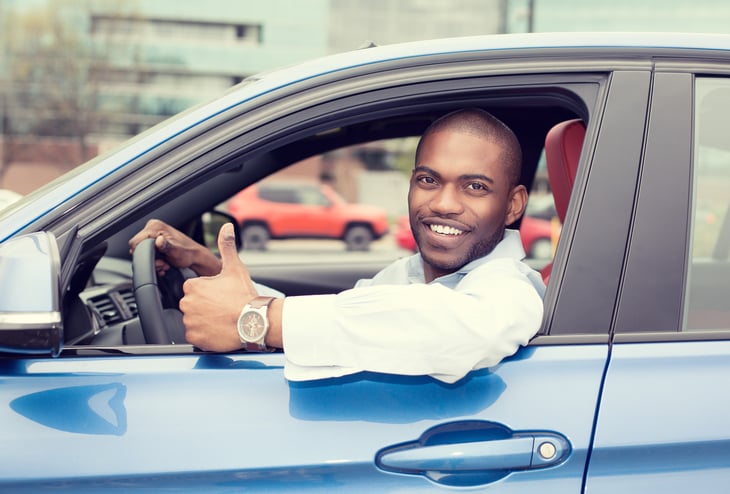 Driver with thumbs up