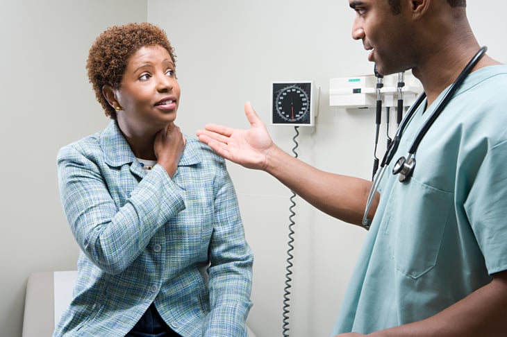 Woman with doctor