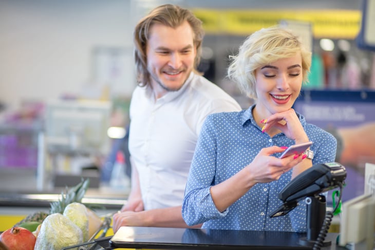 Woman using a digital coupon
