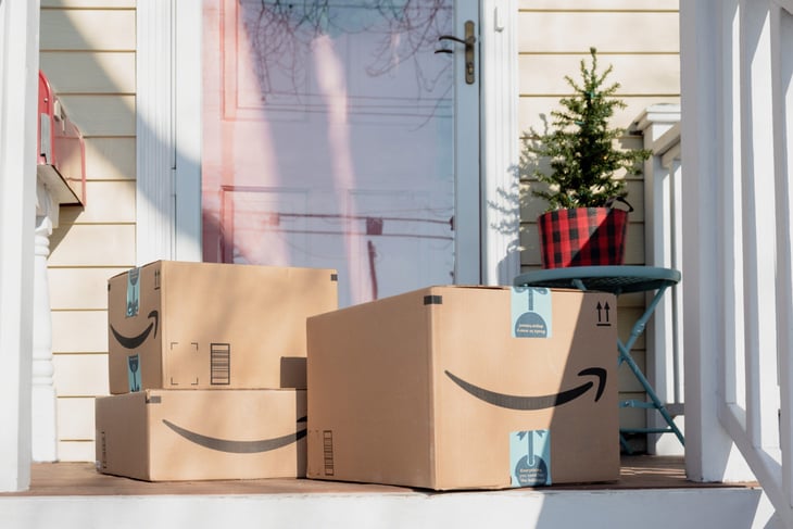 Amazon packages on a front porch