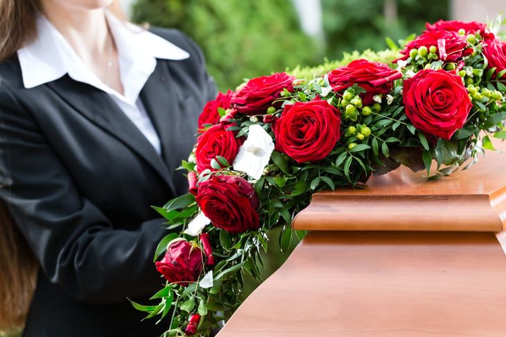 Roses on a casket at a funeral