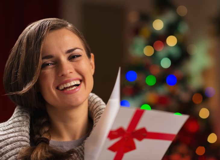 Woman with holiday card