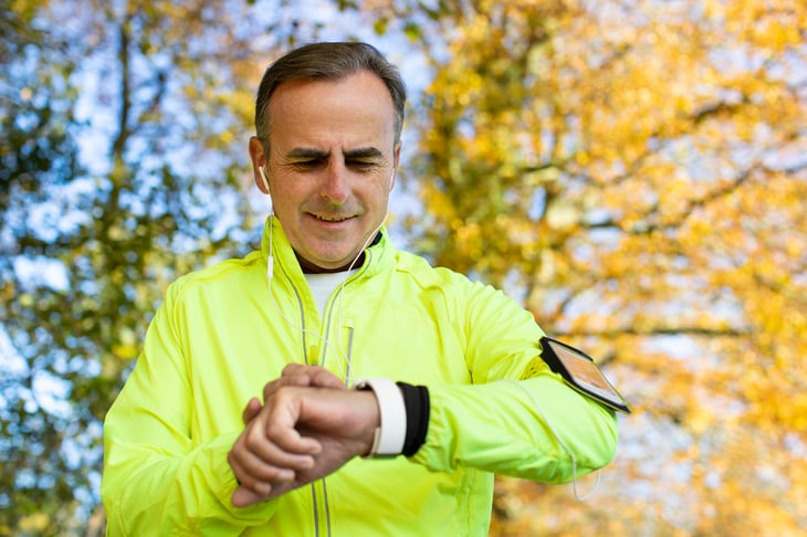 Runner checking his watch