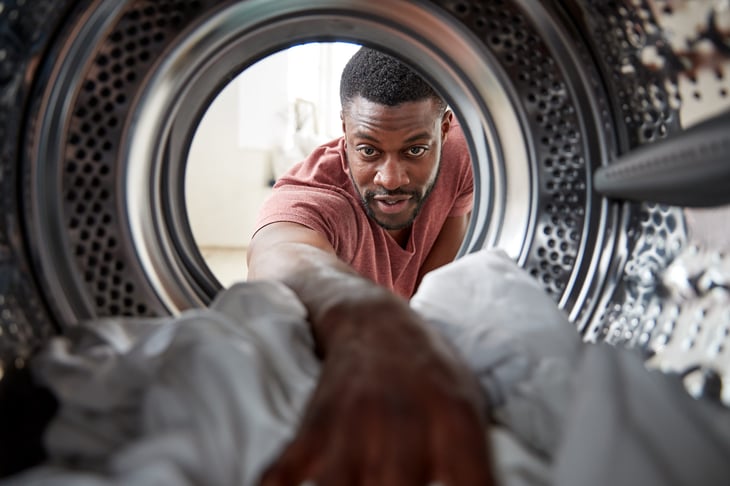 Man washing laundry