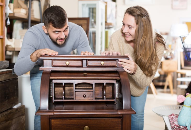 Couple shopping for used furniture