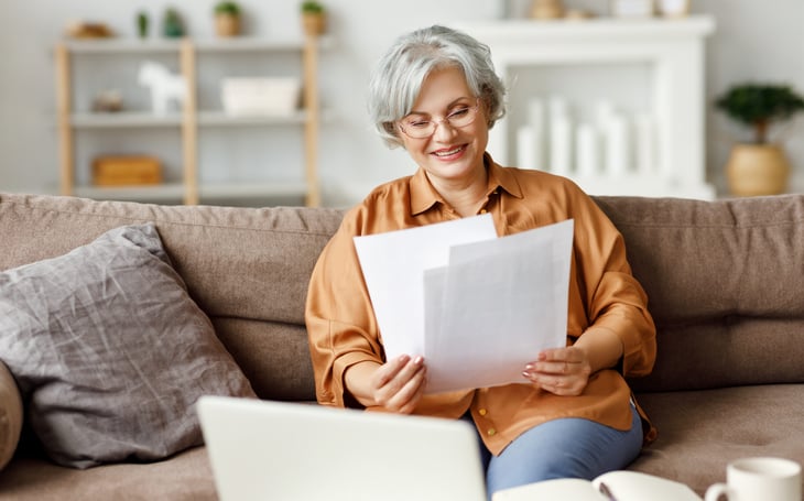 Senior reading her Social Security statement