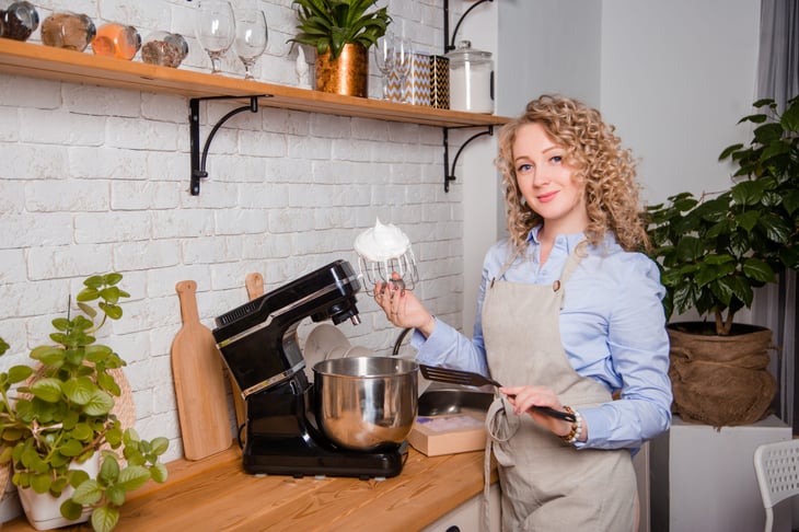 Woman using a stand mixer