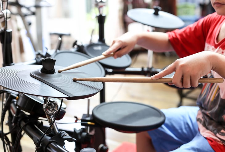 Boy playing electric drums