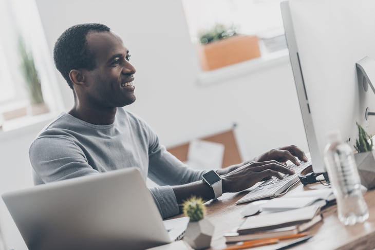 Black man working in home office
