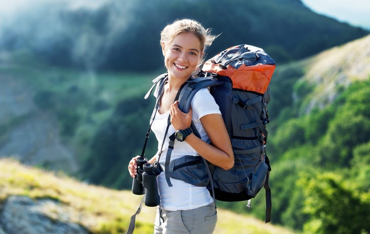 Traveler hiking with a backpack