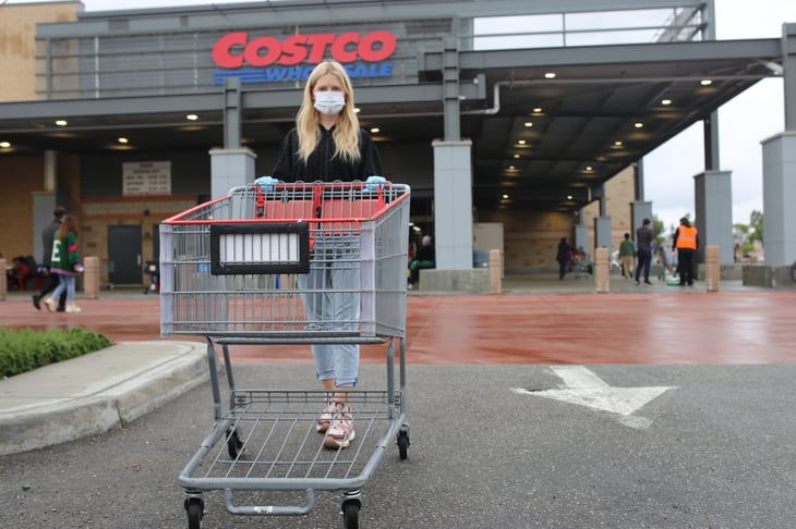 Costco shopper wearing a mask and gloves