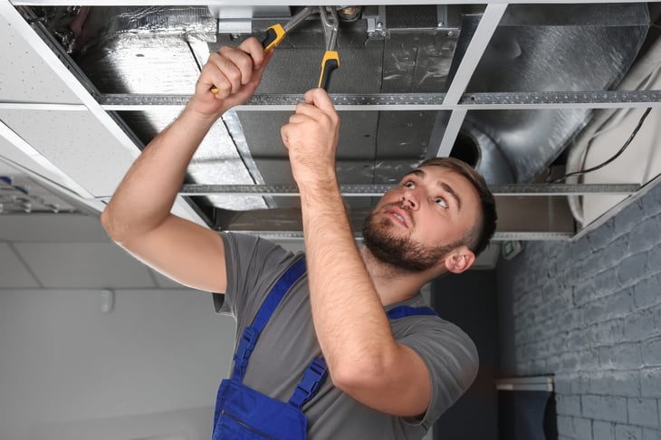 Technician working on a repair call