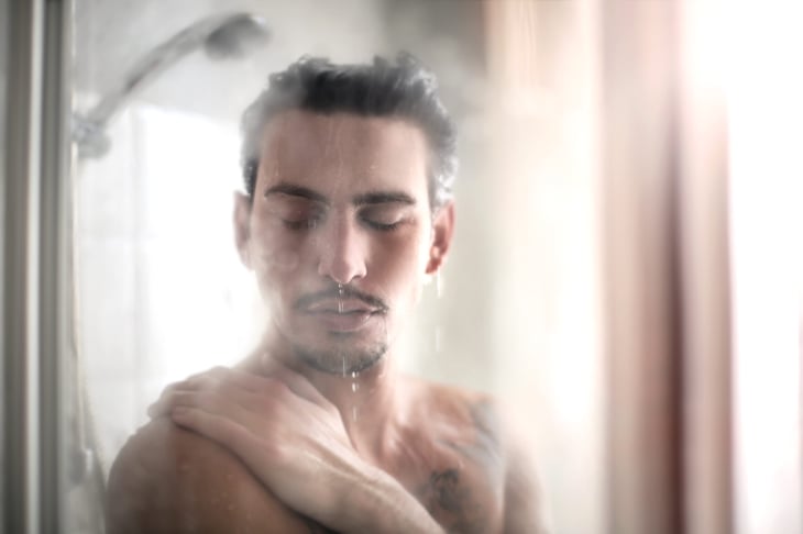 man in shower steam