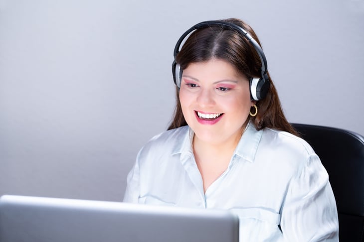 Woman in a headset on a call