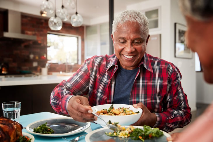 Couple eating a meal at home