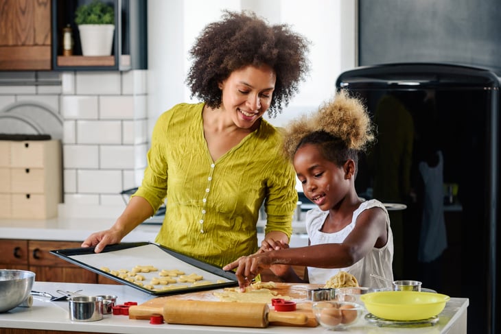 mother baking with her child