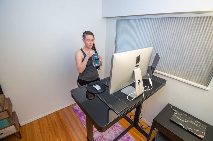 Woman at a standing desk