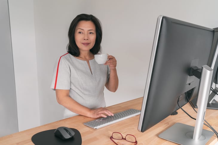 Woman at a standing desk