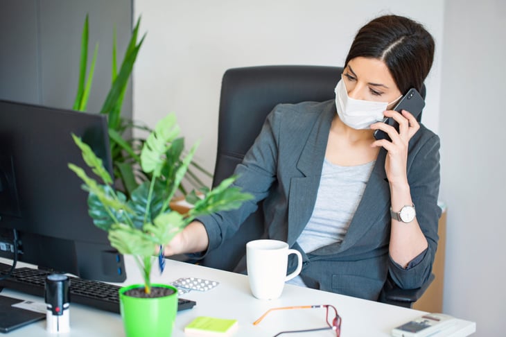woman working in a mask