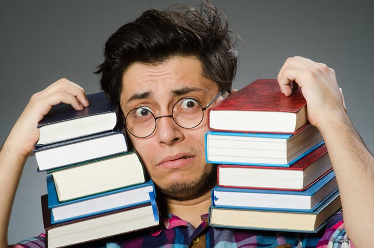 Man with too many books