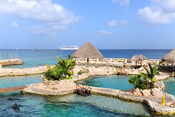 Dolphinarium in Cozumel Mexico with cruise ship in background