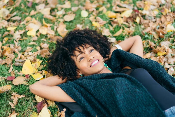 Woman relaxing on a fall day