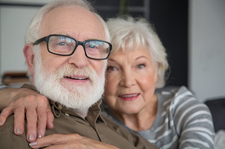 Senior couple looking at the camera