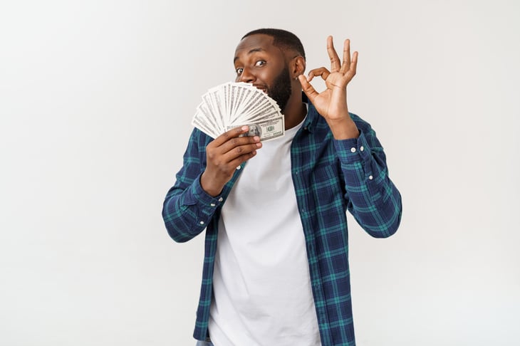 Man holding cash