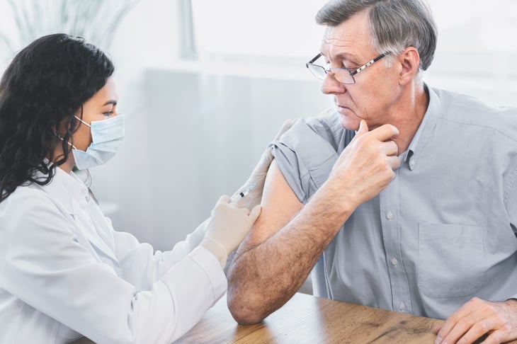 A man getting a flu shot