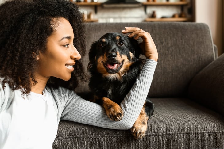 Woman playing with her dog