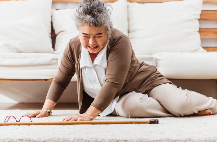 Senior woman falling down