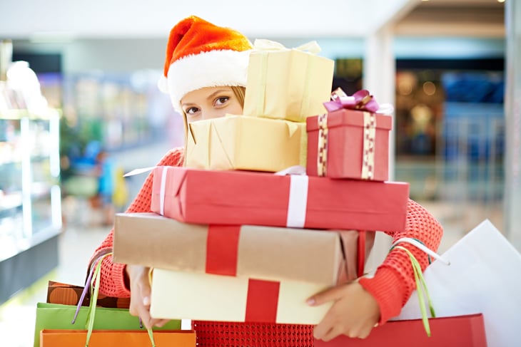 Holiday shopper with gifts
