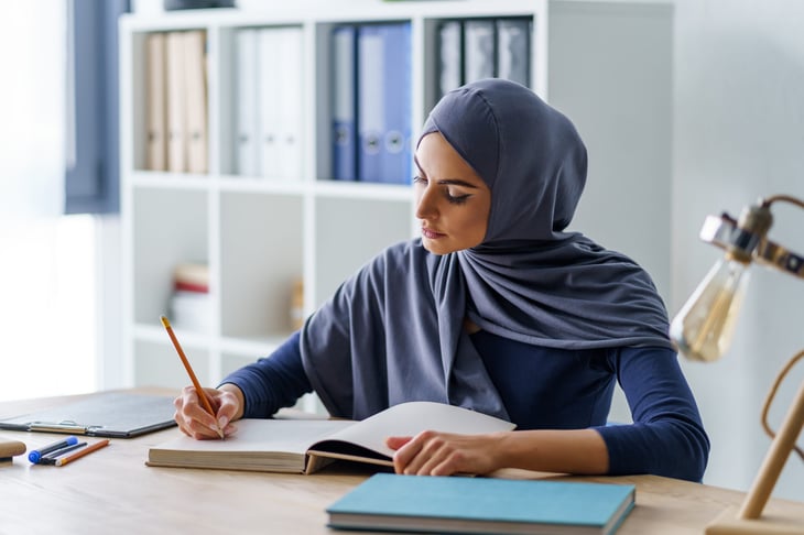 Woman studying at a desk