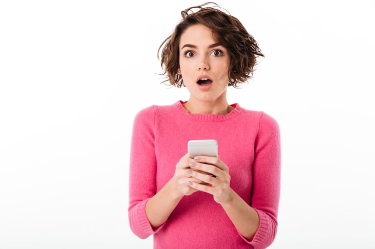 Woman shocked by her phone bill