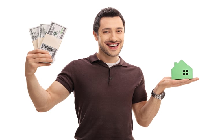 Happy man with money and a house