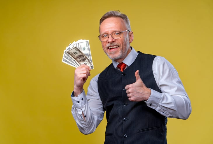 Senior man with money
