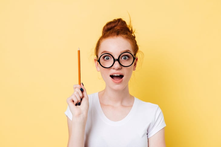 Woman holding a pencil