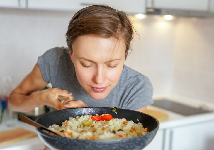 Woman cooking rice