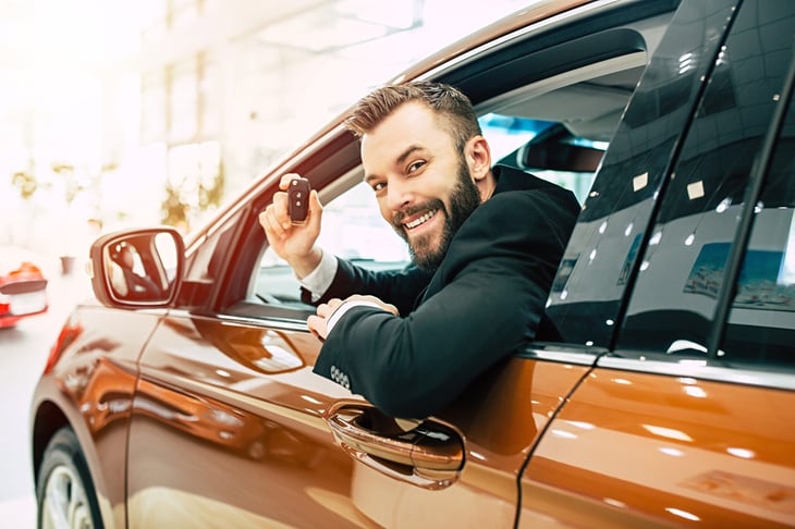 Man in a new car