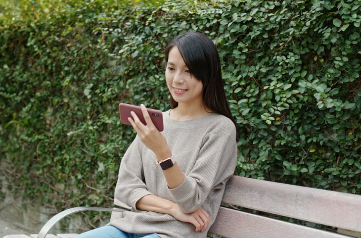 Woman watching her phone