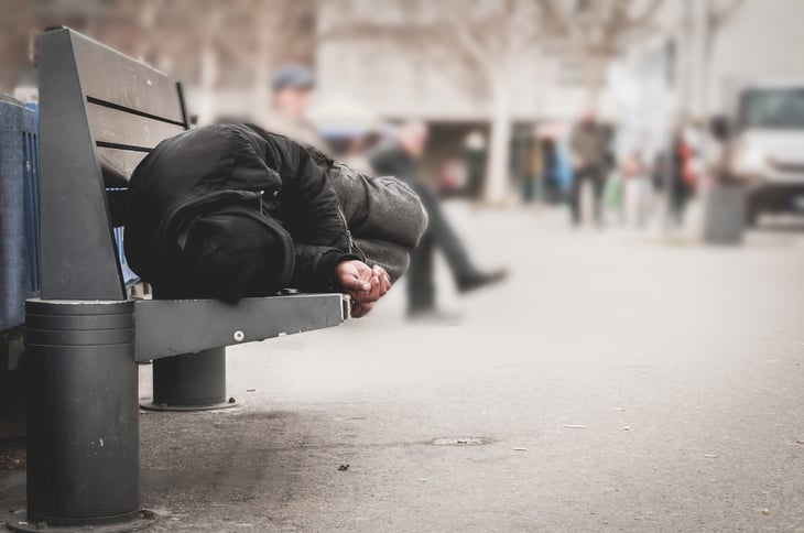 homeless sleeping on bench