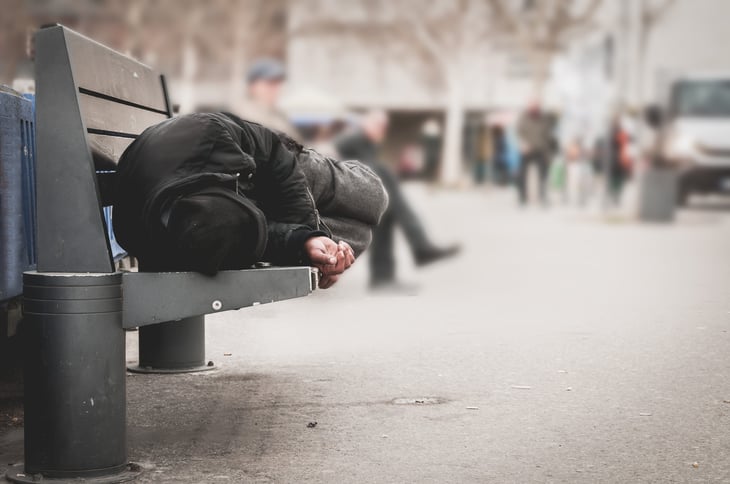 homeless sleeping on bench