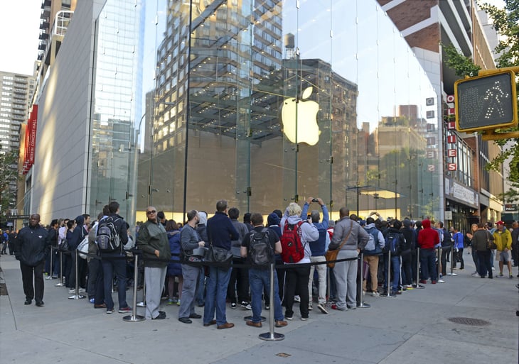 People waiting in line for an iPhone