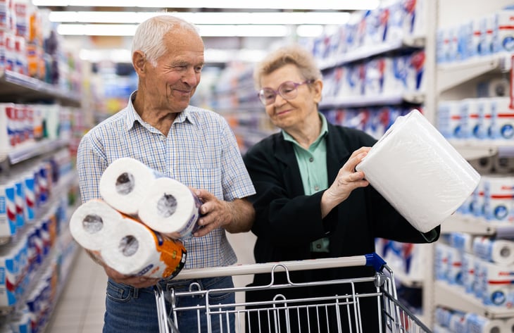 Couple buying paper towels