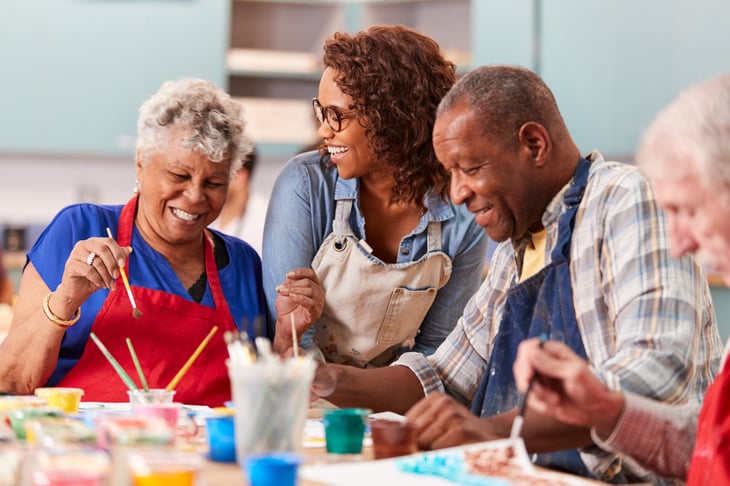 senior woman art class business owner