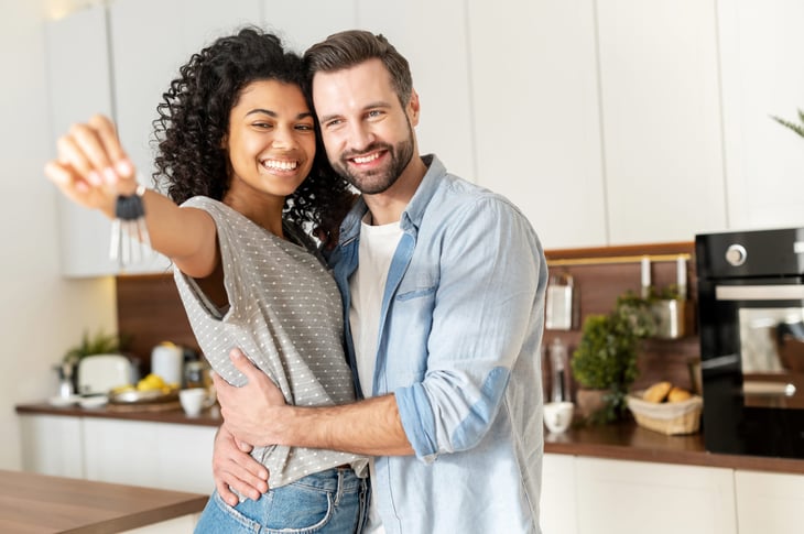 Happy homeowner couple