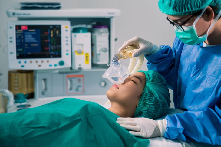 Anesthesiologist giving patient anesthesia