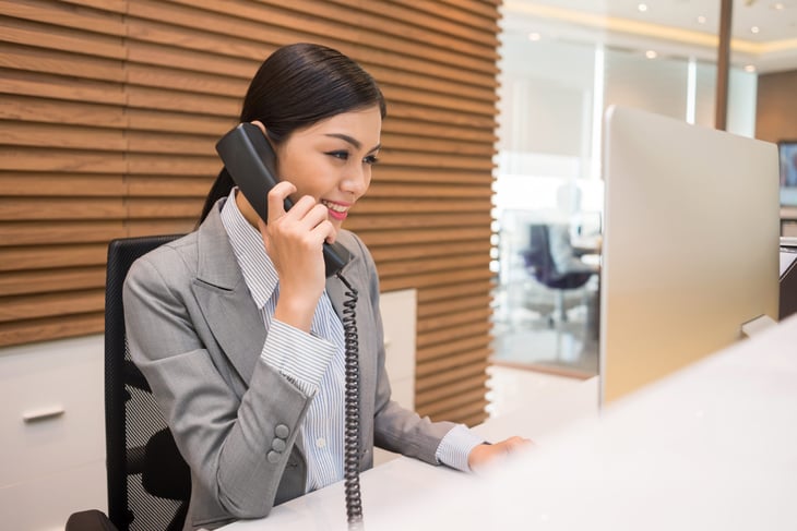 Receptionist talking on the phone