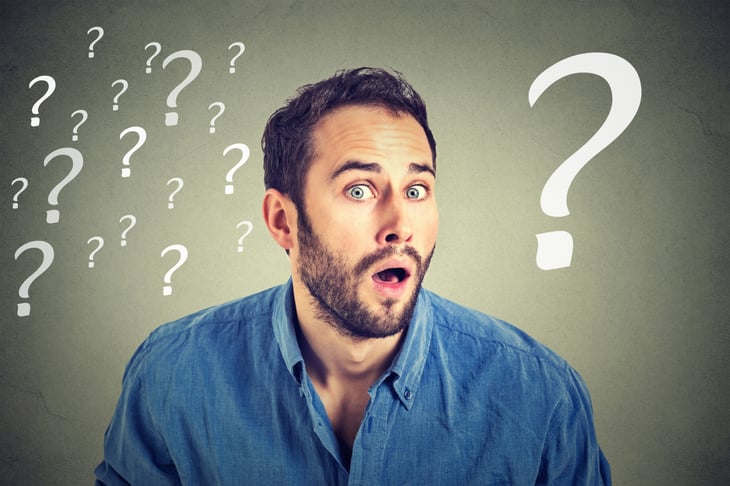 Confused man with question mark